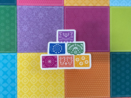 papel picado sticker on colorful background