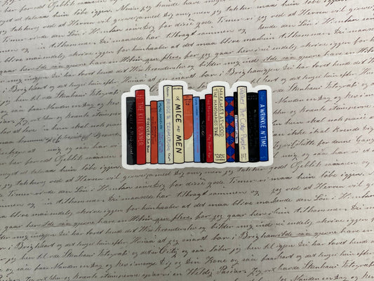 Decorative book-shaped sticker on a piece of handwritten text