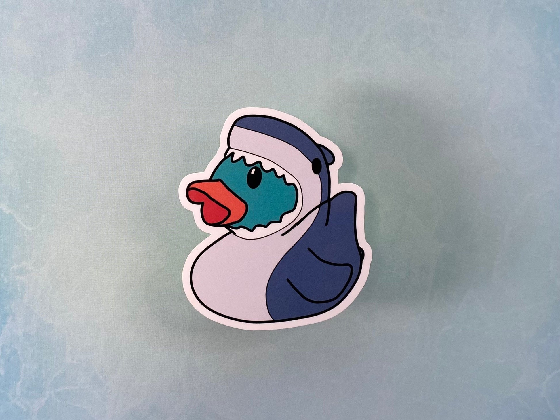 shark duck on blue background