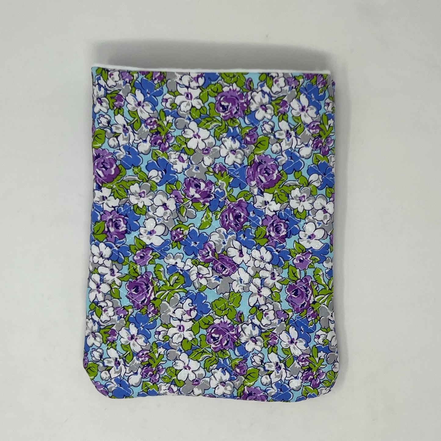 blue and purple quilted book sleeve