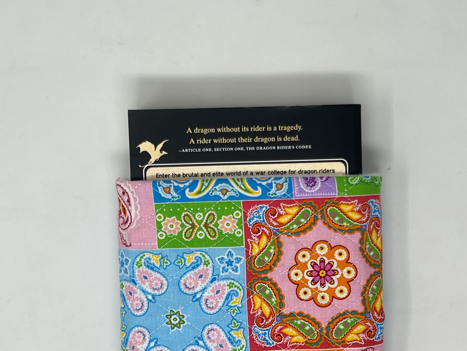 Patchwork book sleeve with book inside