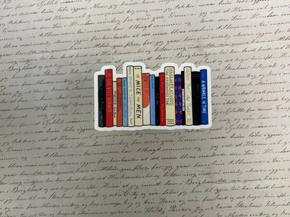 Decorative book-shaped sticker on a piece of handwritten text