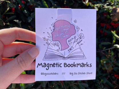 Hand holding a package of magnetic bookmarks with branding text.