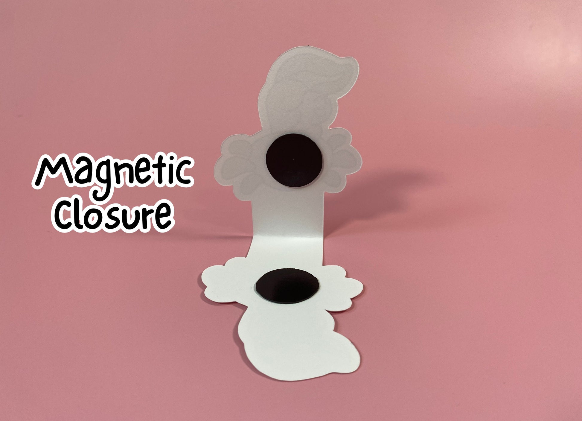 Magnetic closure shown on a pink background