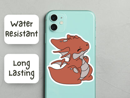 Phone case with cartoon dragon design on a light blue background, featuring 'Water Resistant' and 'Long Lasting' text.
